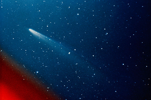 Color photograph of the comet Kohoutek (C/1973 E1), taken by members of the lunar and planetary laboratory photographic team from the University of Arizona, at the Catalina observatory with a 35mm camera on January 11, 1974.