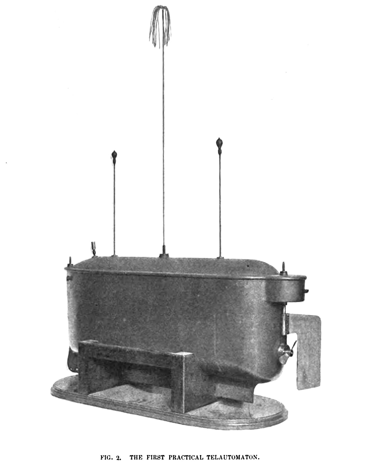 FIG. 2. The First Practical Telautomaton. A machine having all its bodily or translatory movements and the operations of the interior controlled from a distance without wires. The crewless boat shown in the photograph contains its own motive power, propelling- and steering-machinery, and numerous other accessories, all of which are controlled by transmitting from a distance, without wires, electrical oscillations to a circuit carried by the boat and adjusted to respond only to these oscillations.
